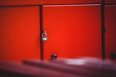 Close-up of red lockers in locker roomの写真素材