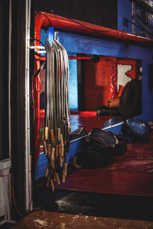Many skipping ropes hanging in fitness studioの写真素材