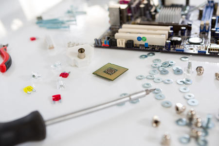 Spare parts of motherboard on table