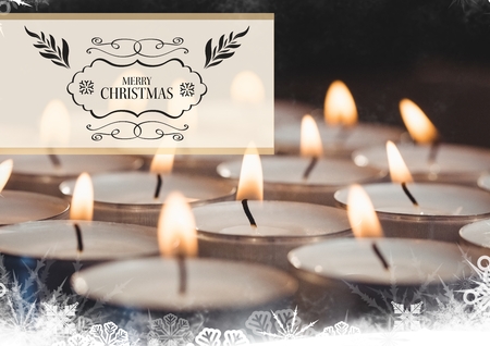 Digitally composite image of merry christmas message against tealight candlesの写真素材