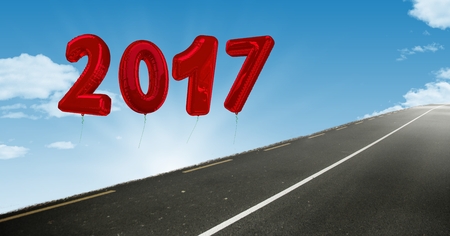 2017 against a composite image 3D of road in blue skyの写真素材