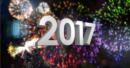 2017 against a composite image 3D of fireworks at nightの写真素材
