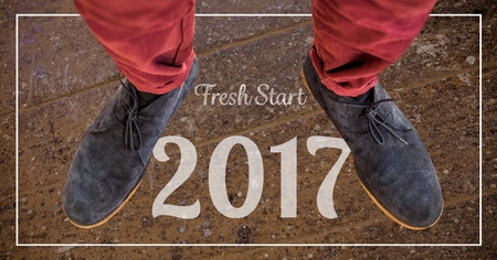 2017 new year wishes against suede chukka boots in backgroundの写真素材