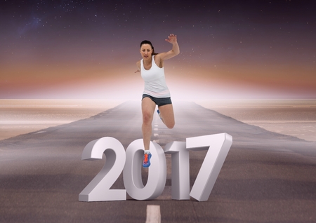 Composite image of 2017 with sports girl running on road during day