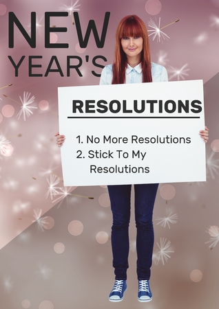 Smiling woman holding a placard with list of new year resolutions goalsの写真素材