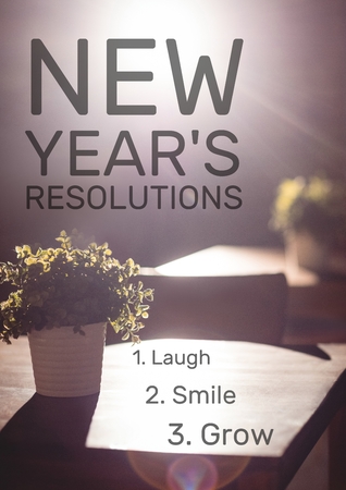 List of new year resolution goals against flower pot in backgroundの写真素材