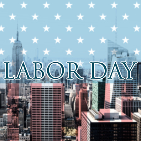 Labor day text  against city skylineの写真素材