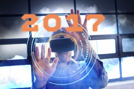 Digital image of new year 2017 against cloudy skyの写真素材