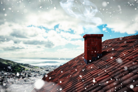 3D Snow falling against landscape of city and cloudy skyの写真素材