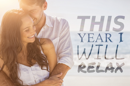 this year i will relax against attractive couple cuddlingの写真素材