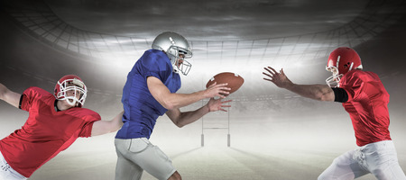 3D American football players against rugby pitchの写真素材