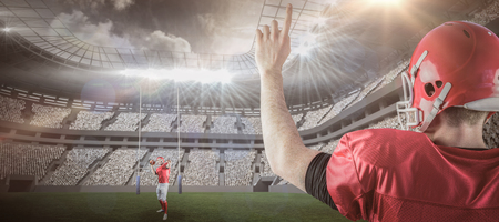 3D American football players against rugby stadiumの写真素材