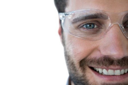Portrait of smiling man wearing protective eyewearの写真素材