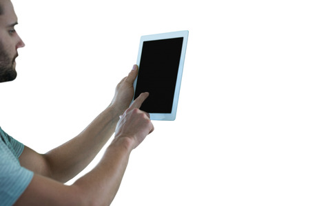Man using a digital tablet against white backgroundの写真素材