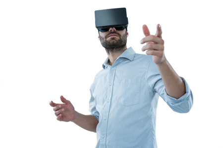 Man using virtual reality headset against white background