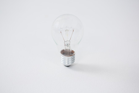 Close-up of electric bulb on white backgroundの写真素材