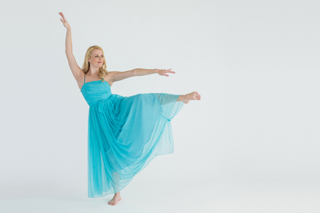 Dancer practicing contemporary dance in dance studioの写真素材