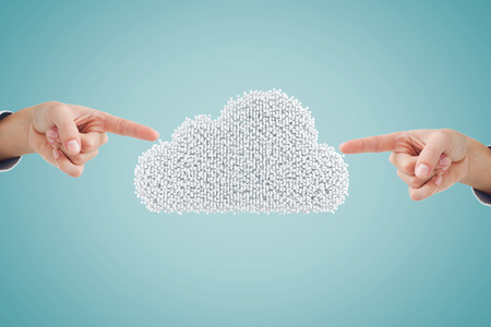 Hand pointing against composite image of cloud