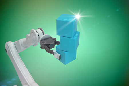 Cropped image of robot hand holding blue boxes against green vignette 3dの写真素材