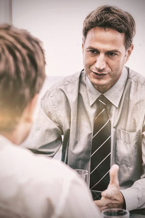 Charismatic manager during a meeting with an employee at the officeの写真素材