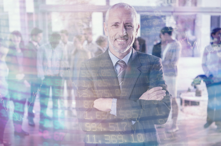 Stocks and shares against portrait of businessman standing in officeの写真素材