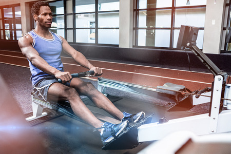 Man working out in gymの写真素材