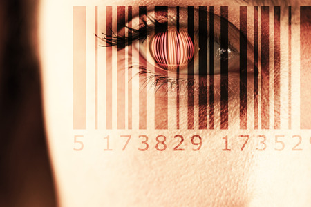 Composite image of Bar code  against close up of gray eyeの写真素材