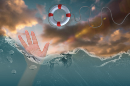 Open hand waving against cloudy sky during sunset 3dの写真素材