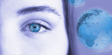 Digitally generated image of earth with social connectivity against portrait of woman with gray eyeの写真素材