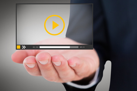 Mid section of a businessman with hands out against grey vignette 3dの写真素材