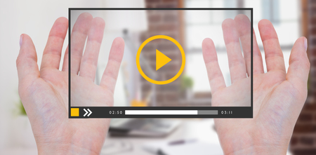 hands against laptop on desk with glasses and notepad 3dの写真素材