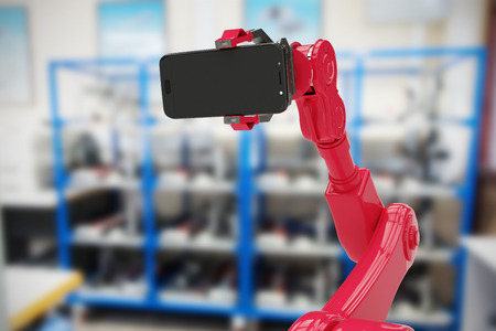 Composite image of robot showing mobile phone against electric equipment on a shelf 3dの写真素材