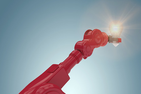 Digital generated image of red robotic arm holding light bulb against grey vignette 3dの写真素材
