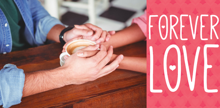 Web against cropped image of couple holding handsの写真素材