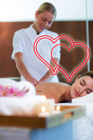 woman receiving back massageの写真素材