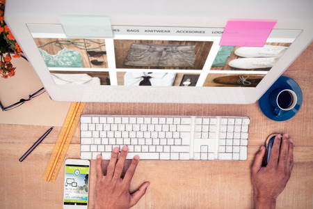 shop with style homepage against high angle view of businessman working on computerの写真素材