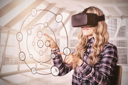 Pretty casual worker using oculus rift against modern office