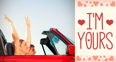 Smiling couple going on holidays together against backgrounds workingの写真素材