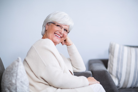 Portrait of smiling senior woman in hospitalの写真素材