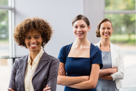 Portrait of confident and beautiful business executives at conference centreの写真素材