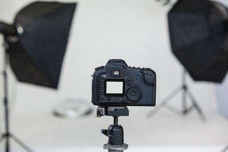 Close-up of digital camera on tripod in studioの写真素材