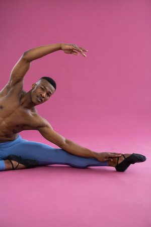 Portrait of ballerino practicing ballet dance in the studioの写真素材