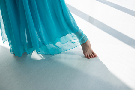 Dancer practicing contemporary dance in dance studioの写真素材