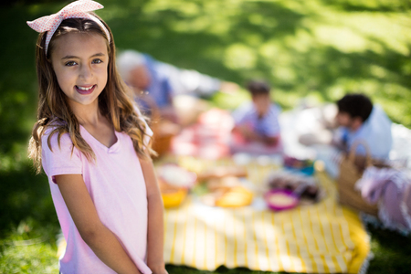 Portrait of a girl in park on sunny a dayの写真素材