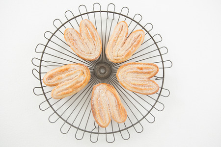 Close-up of sweet food on cooling rackの写真素材