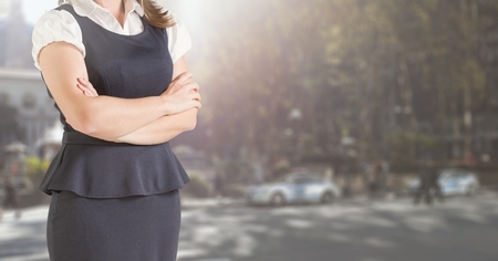 Digital composite of Businesswoman Torso in the streetの写真素材