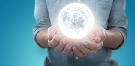 Man holding invisible object  against blue vignette backgroundの写真素材