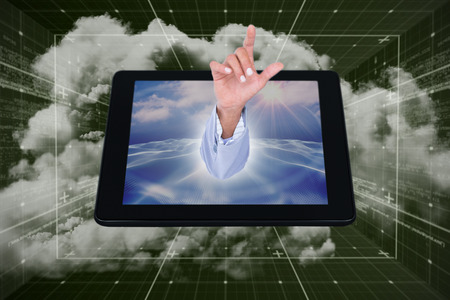 3D Midsection of businessman touching invisible screen against greenの写真素材