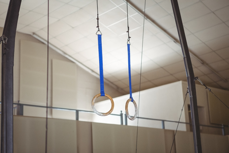 Close-up of rings in gymnasiumの写真素材