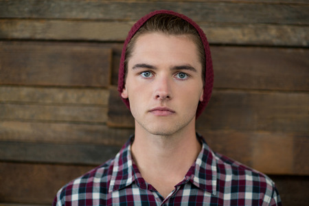 Portrait of confident business executive standing in officeの写真素材